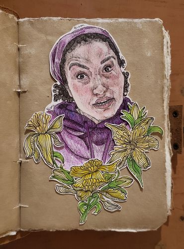 A portrait of Palestinian Journalist Bisan Owda with flowers.