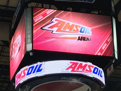 The AMSOIL Arena jumbotron in colors of red, white and blue.