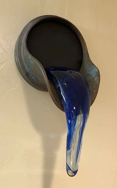 Bronze spout and glass drip by Santa Barbara artist Tal Avitzur.
