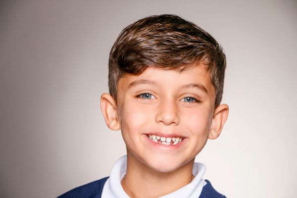 Boy smiling in school photo
