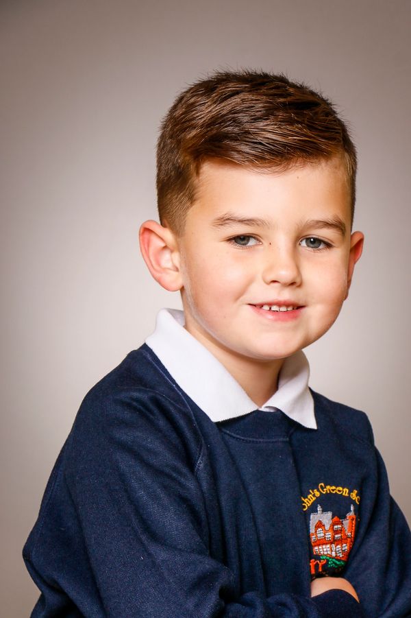 Boy smiling in school photo