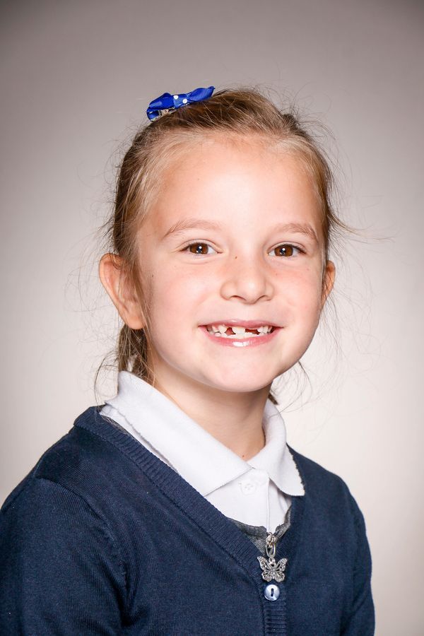 Girl smiling in school photo