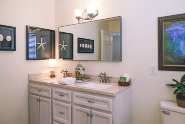 house, real estate, buy, sell, invest, patty, scott, style, sold, stage, property, tallahassee, home, yard, landscape, patio, trees, fence, ceiling, fans, kitchen, tile, back splash, refrigerator, microwave, bay, pond, view, san luis