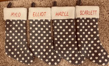 Custom embroidery text Meg at 425-780-8104