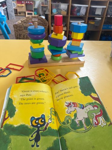 Learning about colors when we read and play with our manipulatives