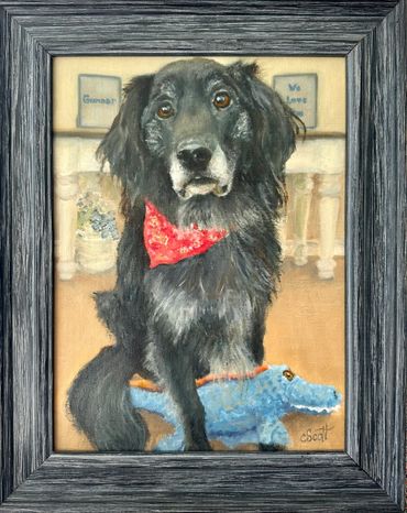 Painting of a black dog with a red bandana and a blue plush toy.
