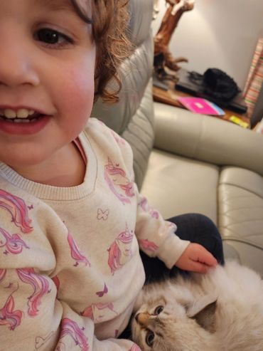 Happy Toddler cuddling Astrielle