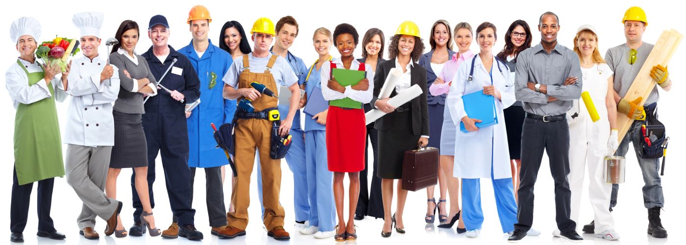 A diverse group of professionals in various work uniforms standing together.