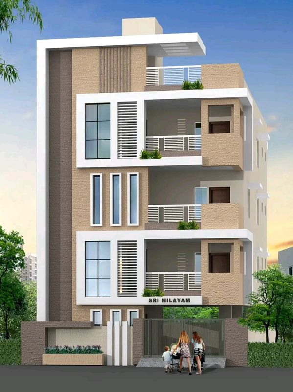 Modern three-story residential building with balconies and greenery.