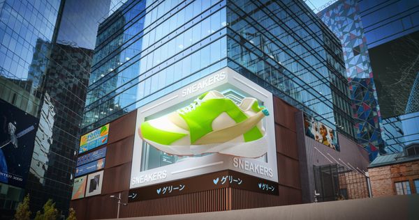 A large digital advertisement showcases bright green sneakers on a building