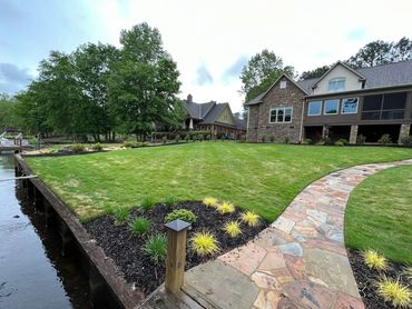 Beautiful lawn at a lake home