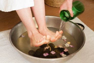 foot soak with water being poured in it