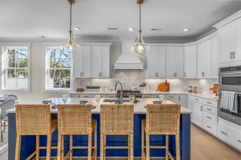 Newly renovated kitchen design and painting by Top gun painting Co.