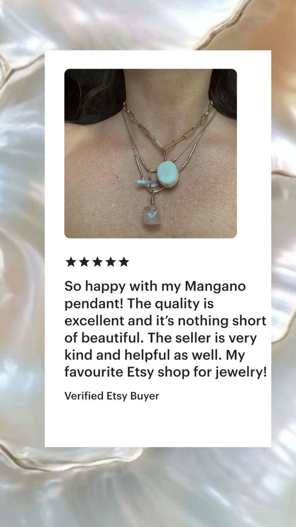 Layered crystal necklace and a 5 star customer review.