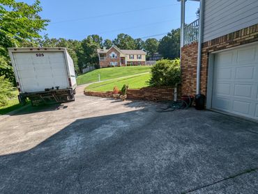 Haul Squad truck parked in Birmingham residential area for curbside pickup