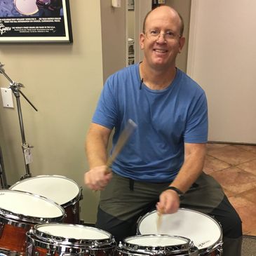 Student Doug Jantz shows off his new drums