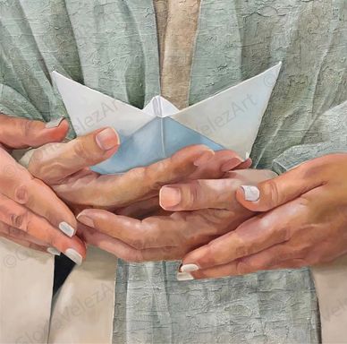 Hands holding a white paper boat delicately.