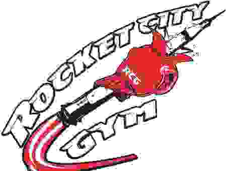 Our boxing gym logo of a glove going through a rocket