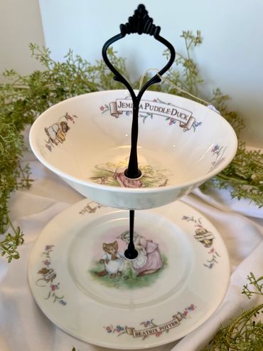 From the World of Beatrice Potter bowl and plate 2-tier tray. A fun way to serve treats or store sup