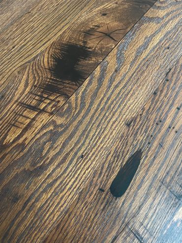 Desk using old barnwood. The client wanted nail and saw marks to stay, so epoxied to make smooth