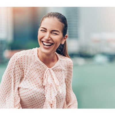 Woman who is happy, healthy and thriving