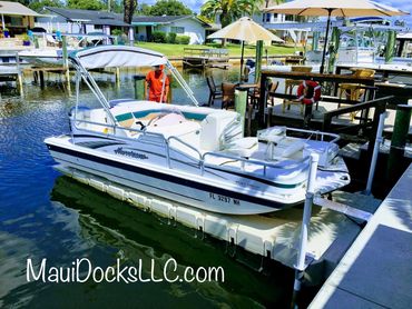 19ft Hurricane Deck boat Wave Armor Genesis 20 boat lift installed by Maui Docks in Cocoa Florida