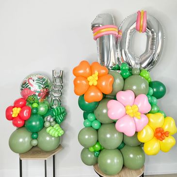 Hawaiian themed balloon column plus happy birthday balloon bouquet