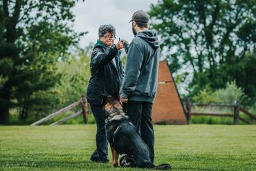Owner with a dog checking in to competition