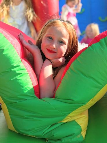 A girl in a bouncy castle