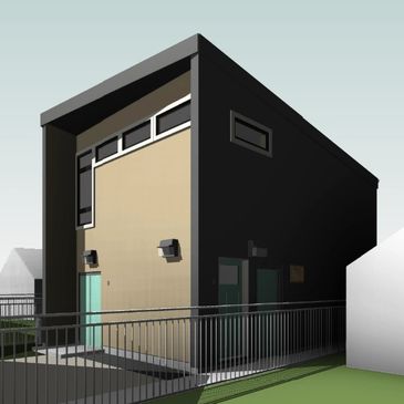 Modern small building with minimalist design and black exterior.