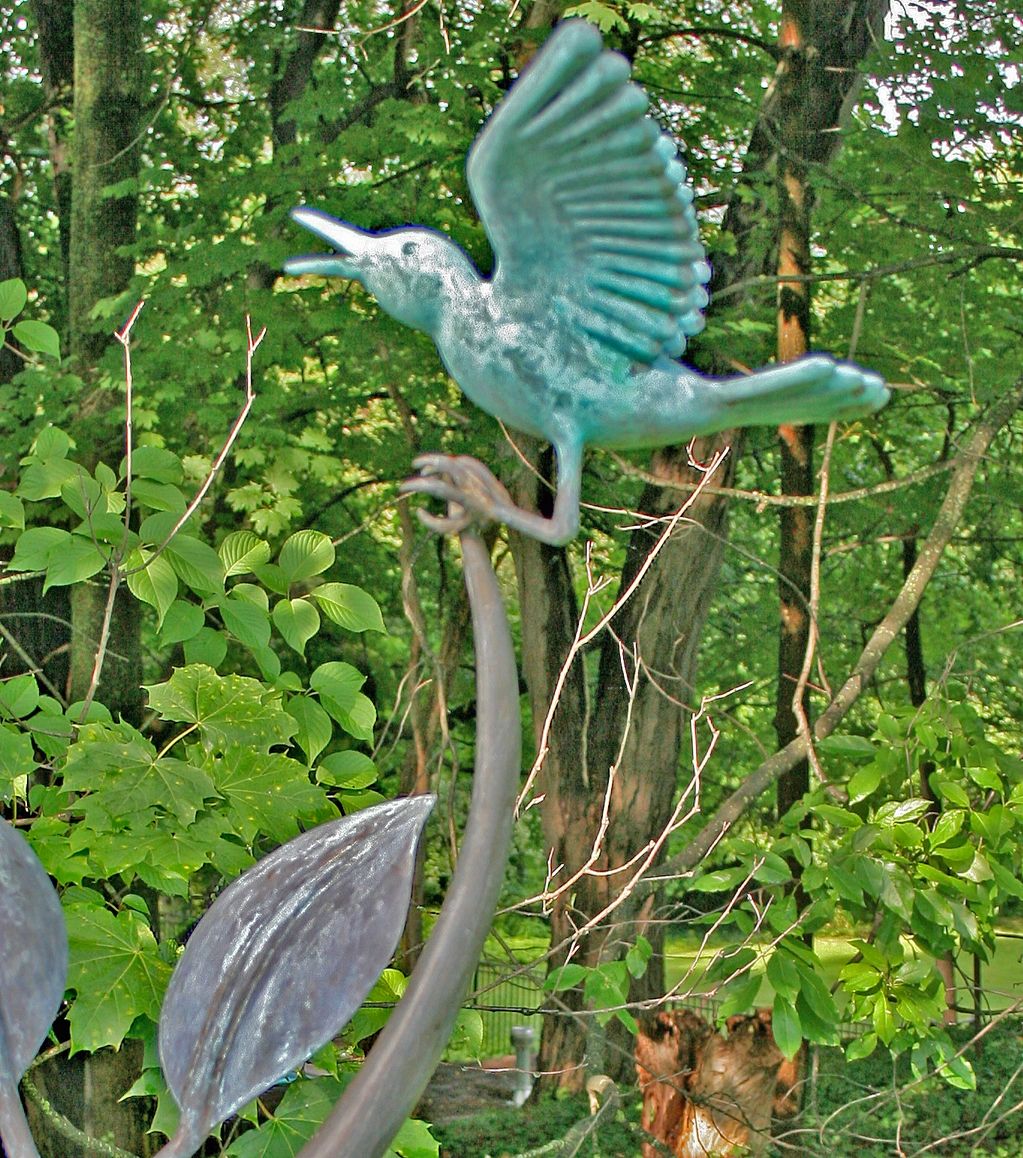 Metal Bird On Metal Tree Limb