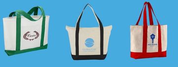 Three canvas tote bags with different logos and colored handles.