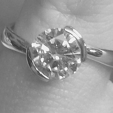 Platinum and diamonds engagement ring. Bespoke design.