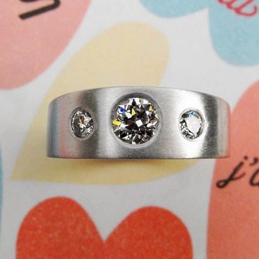 9ct white gold gents ring. Set with customers own heirloom diamonds.