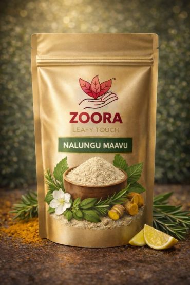 Golden package of Zoora Nalungu Maavu with herbs and lemon slices.