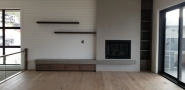 Statement Concrete Plaster Fireplace + Hearth - Kelowna BC - Custom project created by MODE Artisans