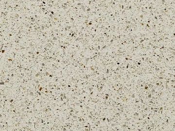 Close-up of a beige terrazzo surface with scattered small stones.