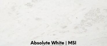 Absolute White marble countertops feature a soft white background with subtle light gray veins.