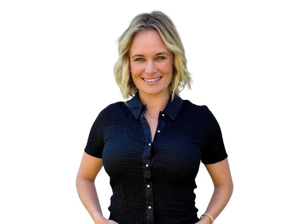 Smiling blonde woman in black textured shirt.