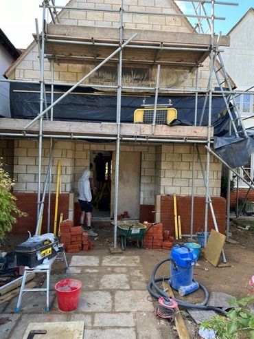 decorative brickwork complete, block work complete, roof complete on double storey extension