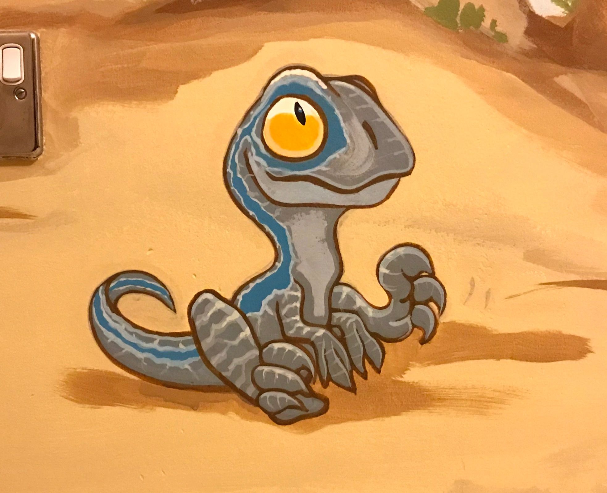 Baby Blue dinosaur painted in a baby room