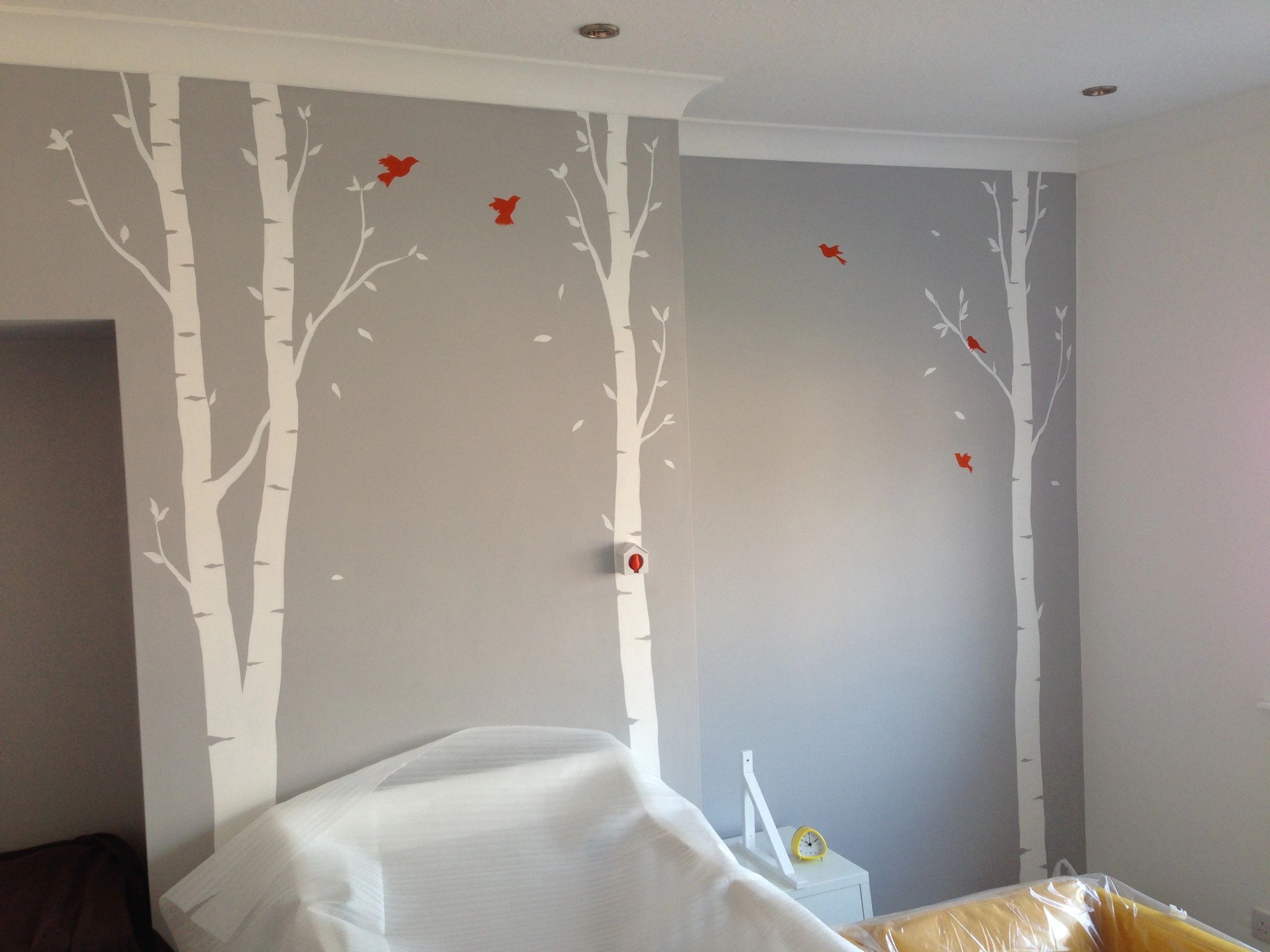 Painted wall mural in a baby room