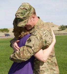 Last hug between Tracie and son Josh prior to his deployment.