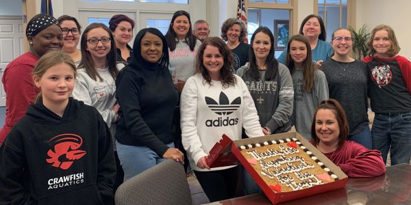 A volunteer group preparing Valentine's Day treat for deployed service members