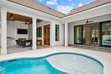 Enjoy family gatherings around your outdoor kitchen and pool.
