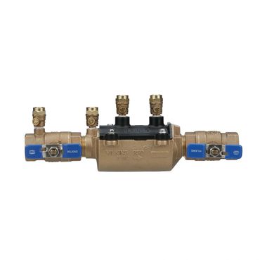 Brass Wilkins 350 water pressure reducing valve with blue handles.