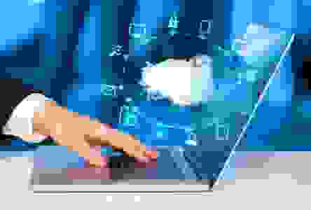 Digital icons hovering over a keyboard