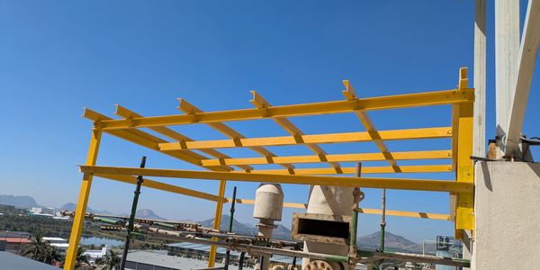 FRP structural frame installation for industrial plant roofing support