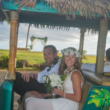 aloha shuttle Poipu Kauai south side wedding white orchids and lilies  bride and groom 