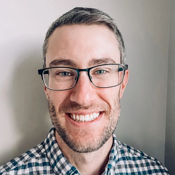 Chris sciberras, a man,  smiling for the camera
